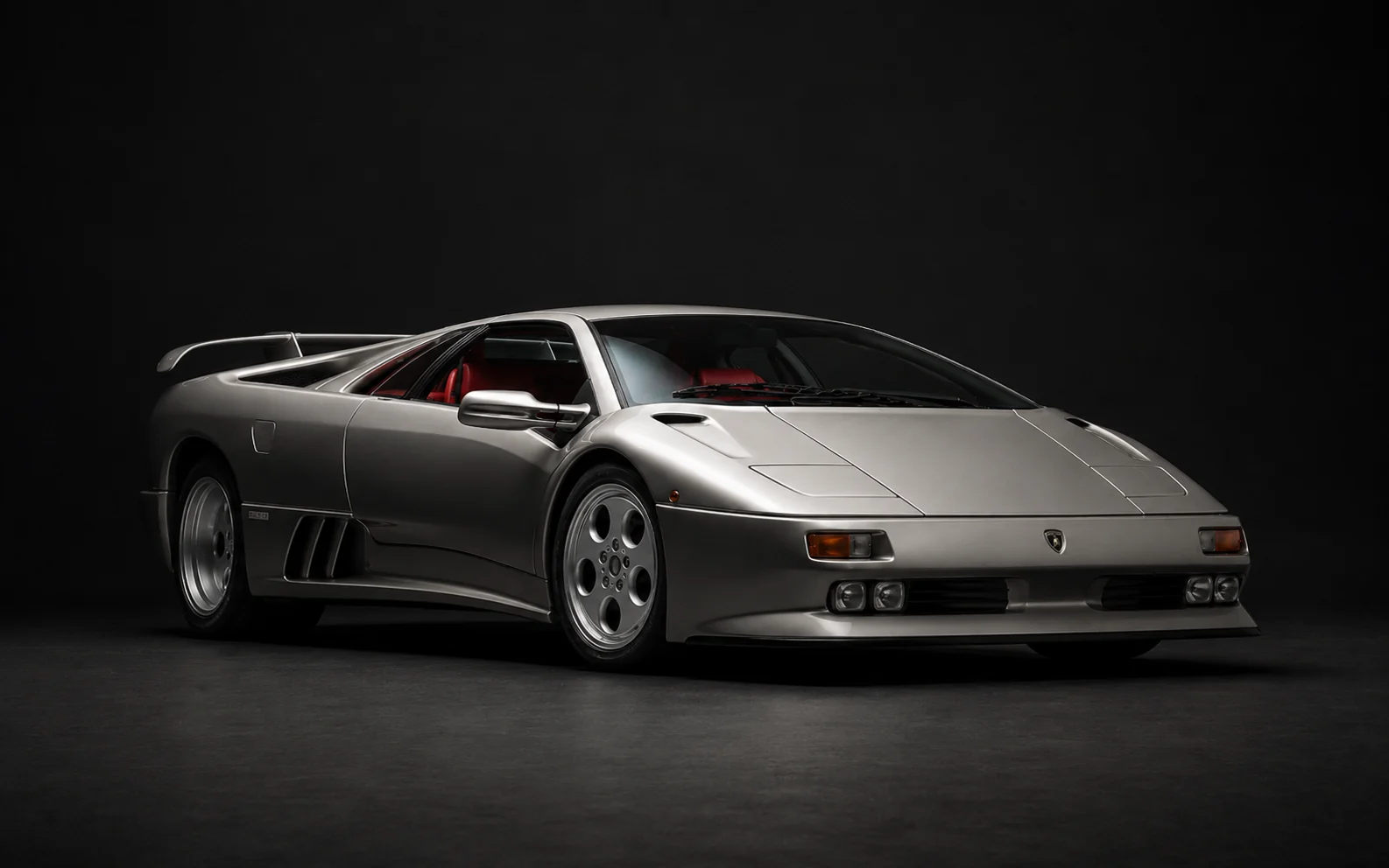 Head-on view of the Diablo SE30 front bumper with corner lamps and slatted brake ducts