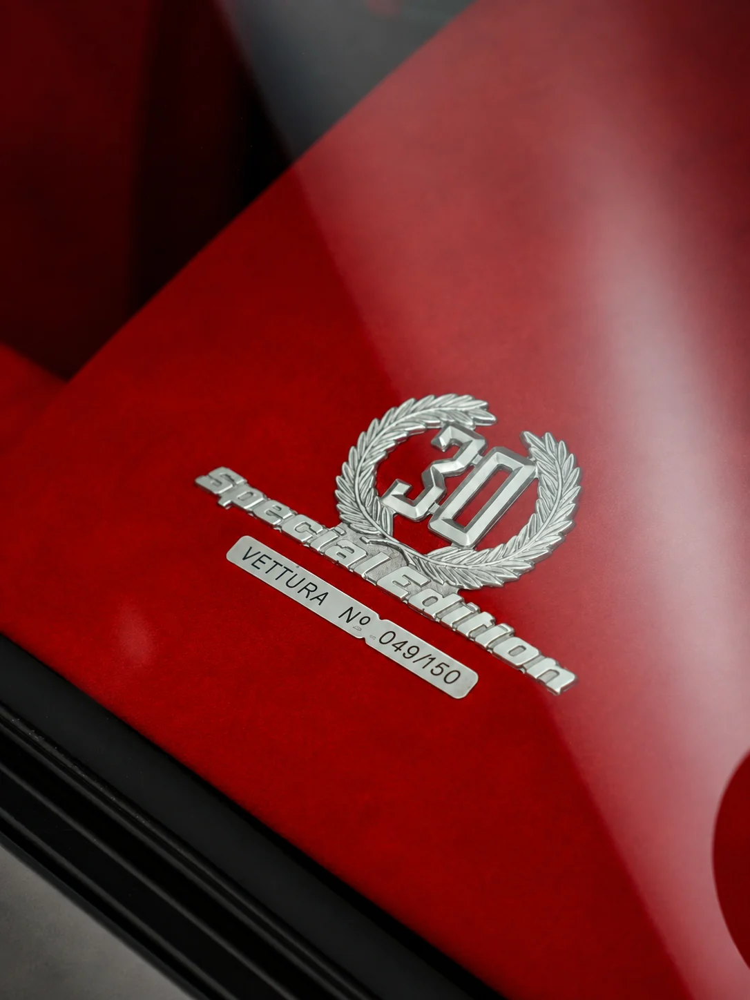 Numbered plaque in the rear side window of Diablo SE30 chassis 12049